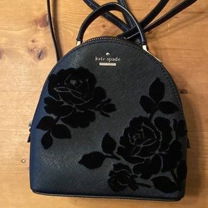 Kate Spade small black leather dressy backpack with velvet flock roses detail